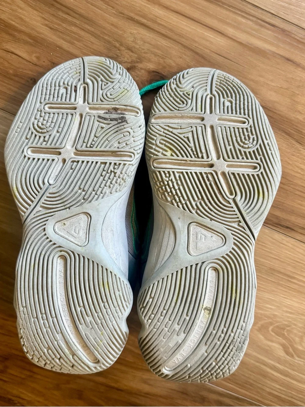 Boys’ gray and green Nike Gianni’s Immortality 3 basketball shoes